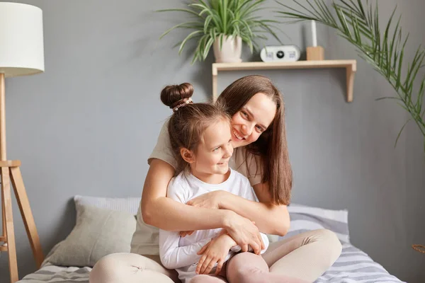 Young Girl Sitting Her Mother Cozy Room Smiling Feeling Togetherness — Stock Photo, Image