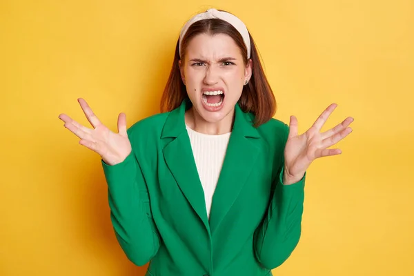 Angry Irritated Woman Wearing Green Jacket Posing Isolated Yellow Background — Stock Photo, Image
