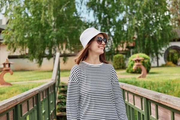 Cheerful Young Woman Wearing Striped Shirt Panama Relaxing Park Standing — Stock Photo, Image