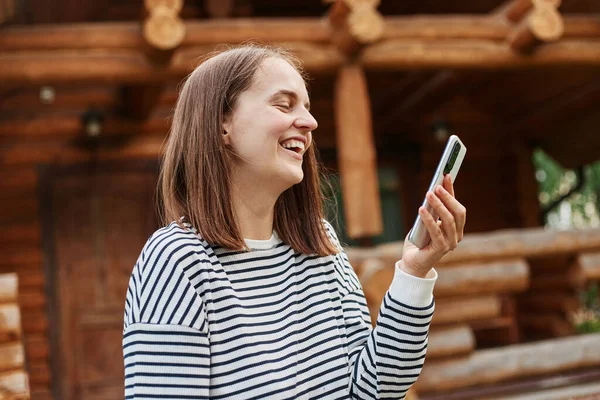 Joyful Dark Haired Woman Wearing Striped Shirt Standing Outdoor Wooden — Stock Photo, Image