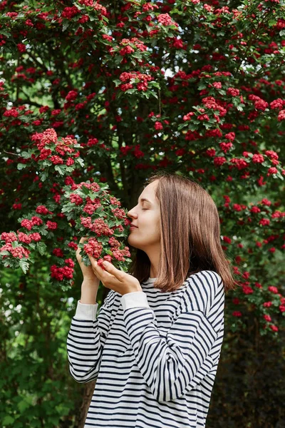 Joyful Satisfied Caucasian Woman Dressed Striped Shirt Posing Blooming Tree — Stock Photo, Image