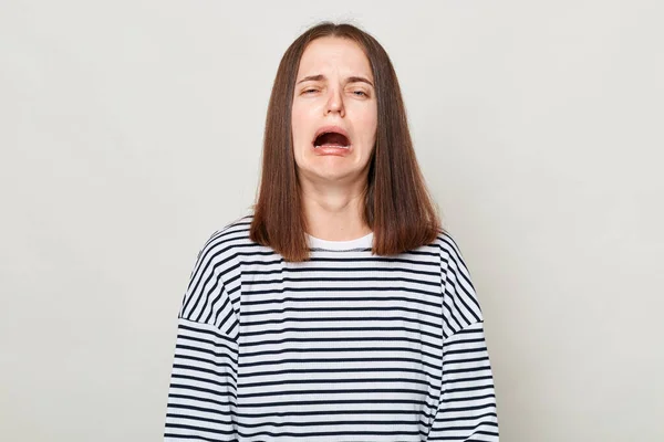 Unhappy Sad Brown Haired Woman Wearing Striped Shirt Posing Isolated — Stock Photo, Image
