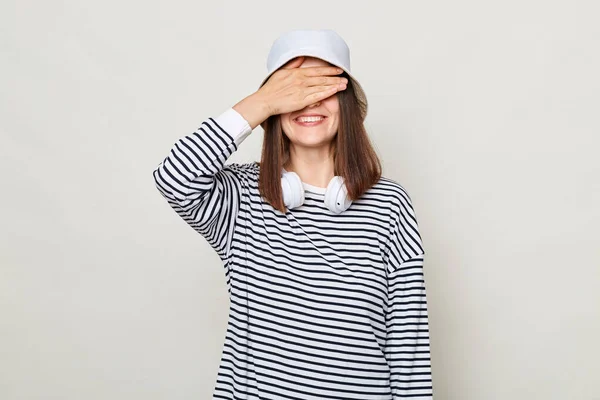 Shy Smiling Woman Wearing Striped Shirt Panama Standing Headphones Neck — Stock Photo, Image
