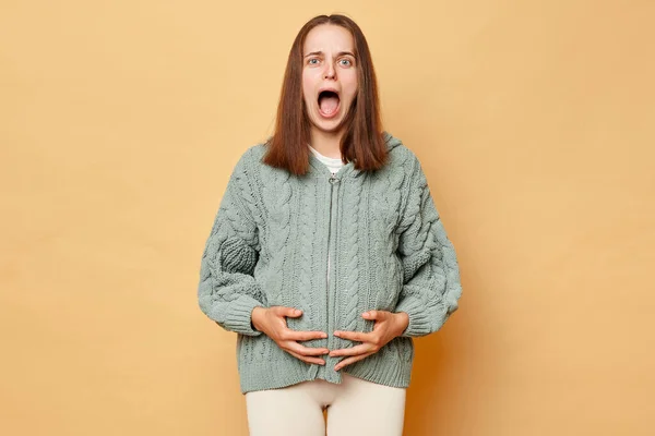 Shocked Scared Pregnant Woman Wearing Knitted Warm Sweater Standing Isolated — Stock Photo, Image