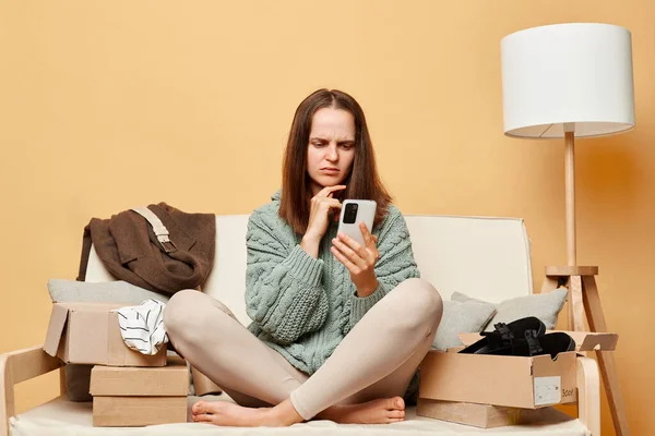Sad Caucasian Young Adult Woman Opening Boxes Postal Parcel Smartphone — Stock Photo, Image