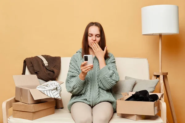 Surprised Woman Wearing Knitted Sweater Ordered Clothes Boxes Sitting Home — Stock Photo, Image
