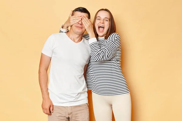 Excited Young Couple Guy Girl Celebrating Posing Isolated Beige Background — ストック写真