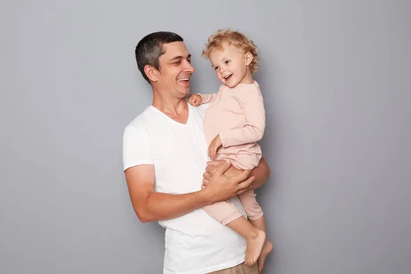 Young Man Holding Little Baby Girl Isolated Gray Background — Stock Photo, Image