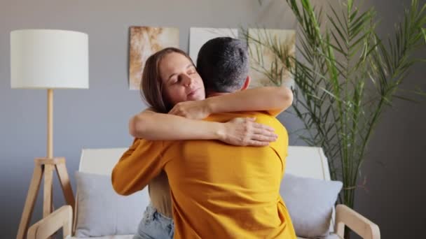 Happy Couple Hugging While Sitting Sofa Living Room Meeting Long — Stock Video