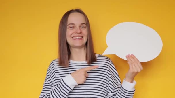 Cheerful Positive Woman Wearing Striped Shirt Holding Speech Bubble Empty — Stock Video
