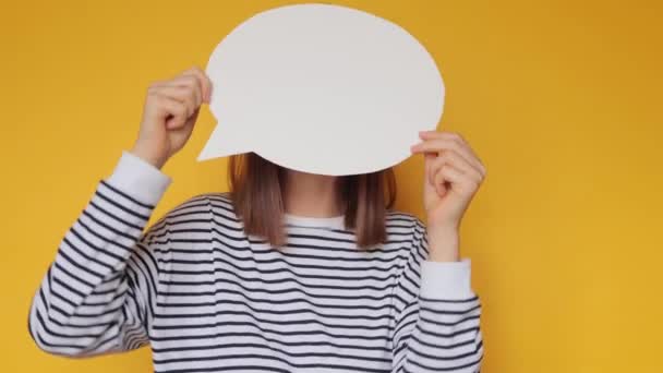 Shy Unrecognizable Woman Wearing Striped Shirt Holding Speech Bubble Copy — Stock Video