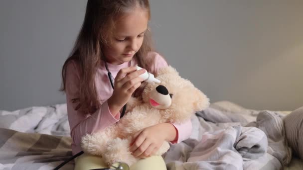Sick Child Spraying Medicine Nose His Teddy Bear Suffering Flu — Stock Video