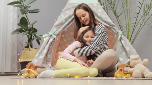 Cute Little Girl Sitting Mother Teepee Shelter Home Hugging Each — Stock Video