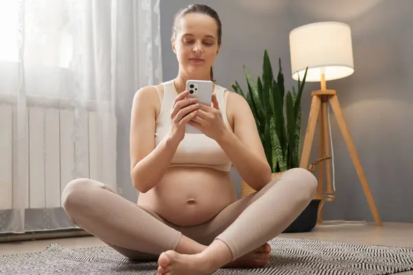 Beautiful Adult Pregnant Woman Beige Sportswear Using Smart Phone Checking — Stock Photo, Image