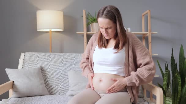 Caucasian Sick Unhealthy Pregnant Woman Suffering Abdominal Pain Sitting Sofa — Stock Video