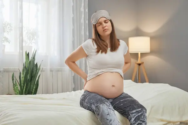 Caucasian Brown Haired Young Adult Sad Pregnant Woman Massaging Her — Stock Photo, Image