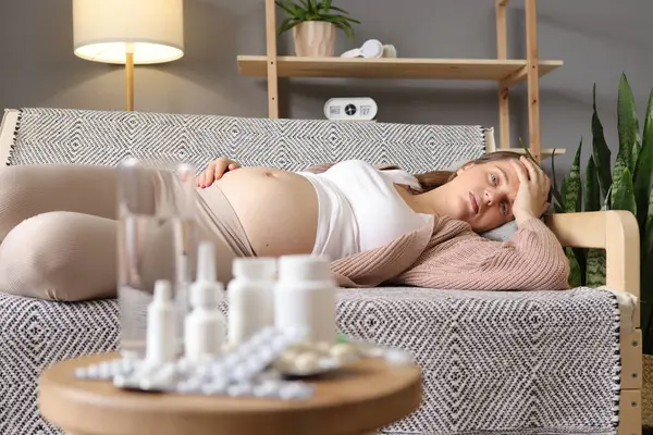 Closeup Sick Pregnant Woman Lying Sofa Home Big Variety Pills Stock Picture