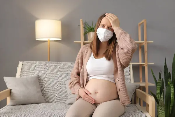 Unhealthy Ill Pregnant Female Wearing Medical Mask Having Virus Suffering Royalty Free Stock Images