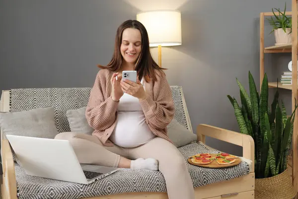 Smiling Happy Pregnant Woman Sit Sofa Having Break His Online Stok Gambar Bebas Royalti