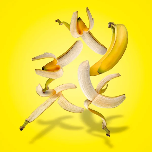 Drijvende Set Bananen Met Schaduwen Gele Helling — Stockfoto