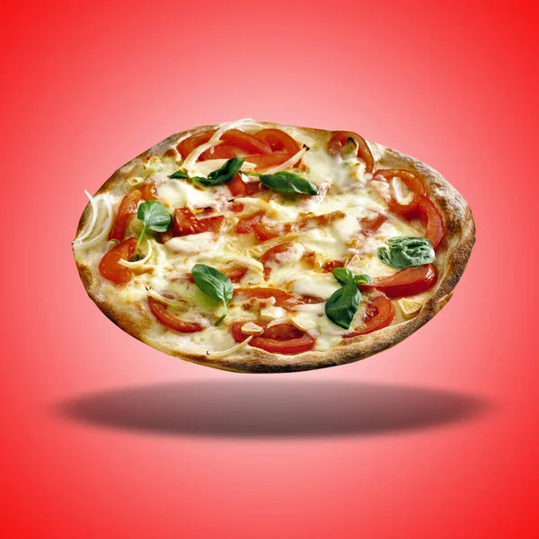 Casarecce Pizza Flottante Sur Fond Gradient Radial Rouge Images De Stock Libres De Droits