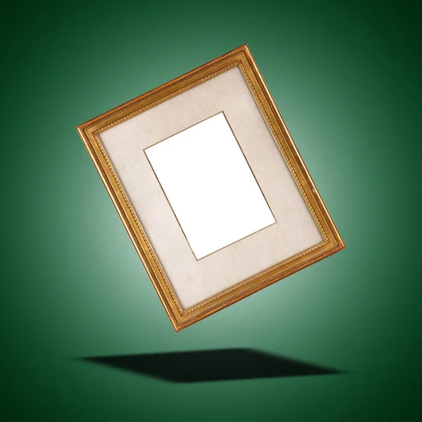 Floating  Antique and vintage frame in wood on green gradient background