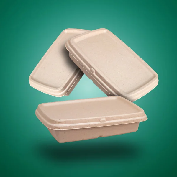 Drijvende Variatie Van Recycling Lunch Take Away Box Tegen Groene — Stockfoto