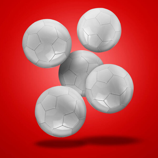Плавающие кожаные футбольные мячи на красном радиальном фоне