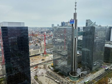 BRUSSELS,BELGIUM -NOVEMBER 21, 2024: Skybridge connecting Proximus - Belgacom Tower I and II, office blocks  on november 21, 2024 in Brussels, Belgium.  clipart