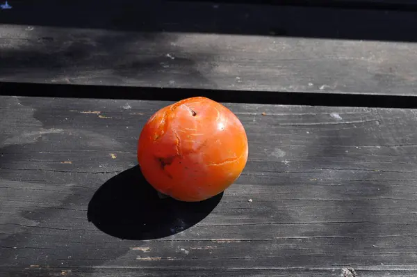 stock image The fresh Ripe persimmons on a plastic box