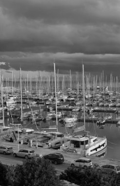 Italy, Sicily, Mediterranean sea, Marina di Ragusa; 23 January 2023, motor boats and luxury yachts in the port at sunset - EDITORIAL