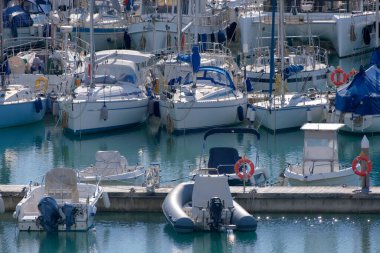 taly, Sicily, Mediterranean sea, Marina di Ragusa (Ragusa Province); 26 January 2023, motor boats and luxury yachts in the port - EDITORIAL