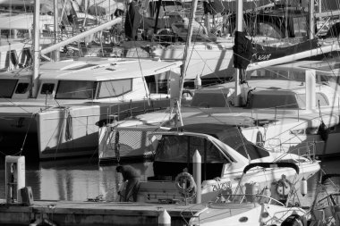 Italy, Sicily, Mediterranean sea, Marina di Ragusa (Ragusa Province); 28 January 2023, people and luxury yachts in the port - EDITORIAL