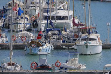 Italy, Sicily, Mediterranean sea, Marina di Ragusa (Ragusa Province); 2 March 2023, motor boats and luxury yachts in the port - EDITORIAL