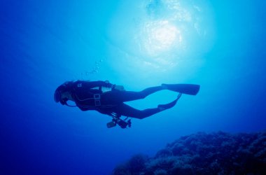 Italy, Mediterranean Sea, U.W. photo, Pantelleria island; female scuba diver (FILM SCAN)