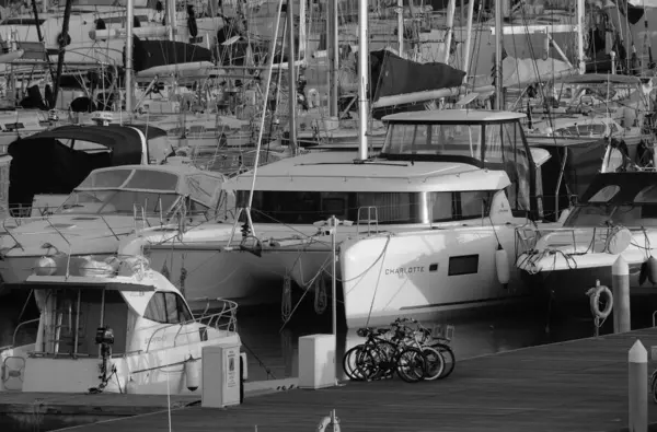 stock image Italy, Sicily, Mediterranean sea, Marina di Ragusa; 25 December 2023, luxury yachts in the port at sunset - EDITORIAL