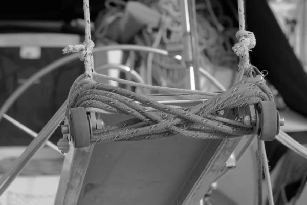 Italy, Sicily, Marina di Ragusa (Ragusa Province), nautical ropes on the boarding ladder of a sailing boat in the port