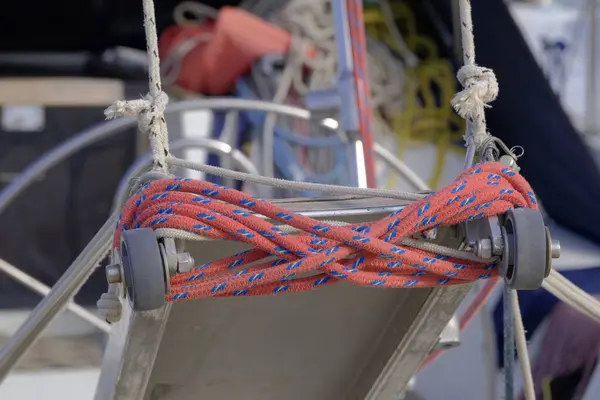 Italy, Sicily, Marina di Ragusa (Ragusa Province), nautical ropes on the boarding ladder of a sailing boat in the port