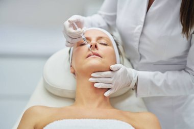 A scene of medical cosmetology treatments botulinum injection. High quality photo