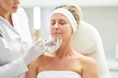 A scene of medical cosmetology treatments botulinum injection. High quality photo