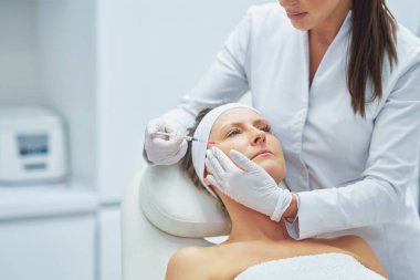 A scene of medical cosmetology treatments botulinum injection. High quality photo