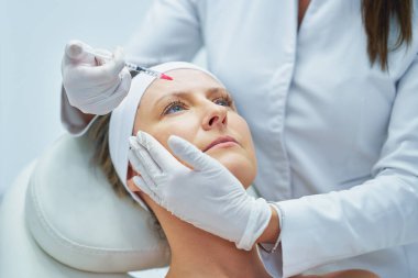 A scene of medical cosmetology treatments botulinum injection. High quality photo