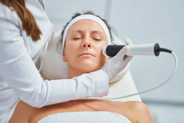 stock image Woman in a beauty salon having face and body treatment. High quality photo
