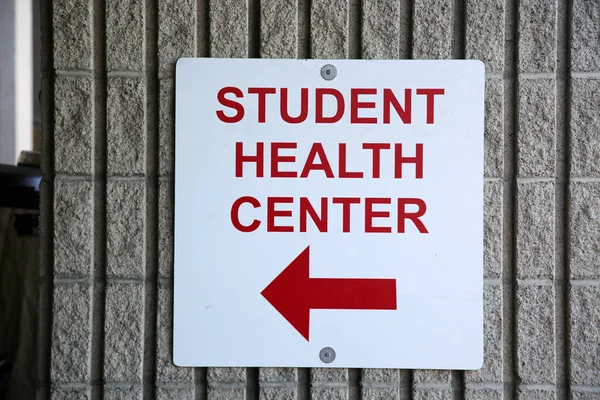 student health center sign with red arrow