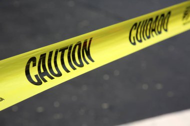 Caution Tape. Yellow Caution Tape. Caution, Cuioado plastic tape. Do not enter tape. Warning sign.