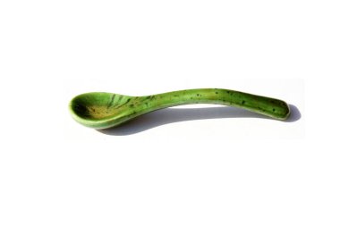 Coke Spoon. 1970 era cocaine snorting spoon. 1970 fashion coke spoon. Drug Snorting spoon. Isolated on white. Room for text. Say no to drugs. Green Ceramic.