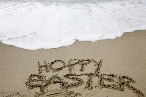 Hoppy Easter Words Hoppy Easter Written Sand Ocean — Stock Photo, Image