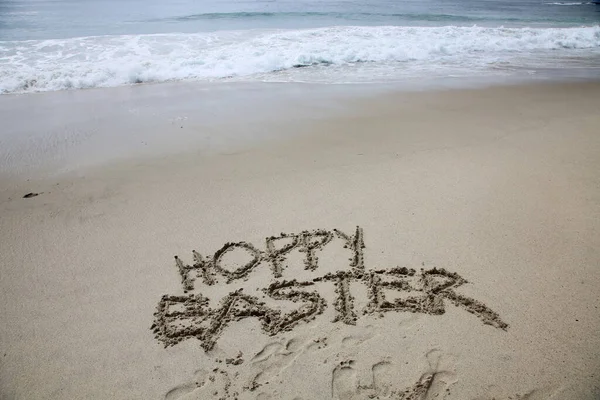 Hoppy Easter Words Hoppy Easter Written Sand Ocean — Stock Photo, Image