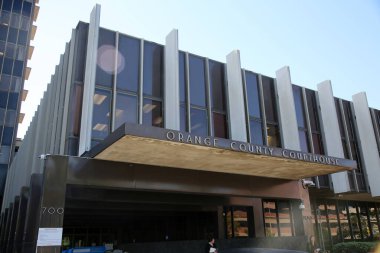 Santa Ana, California - USA - March 12-2022: Building and Location Sign. Superior Court of California. Central Justice Center. Santa Ana California. Orange County Court House. Civic Center Plaza.