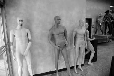 Mannequins. Naked Mannequins in a clothing store.  mannequins without clothes in a shop. Naked plastic dummies  in a store.